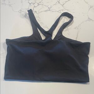 Lululemon S/M. Black sports bra. Worn once. Fits like a medium. No flaws.